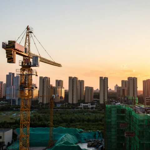 A China skyline with construction taking place.