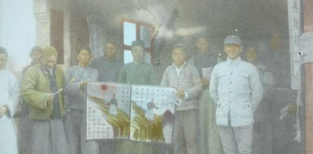 Gospel poster being displayed by evangelist An.