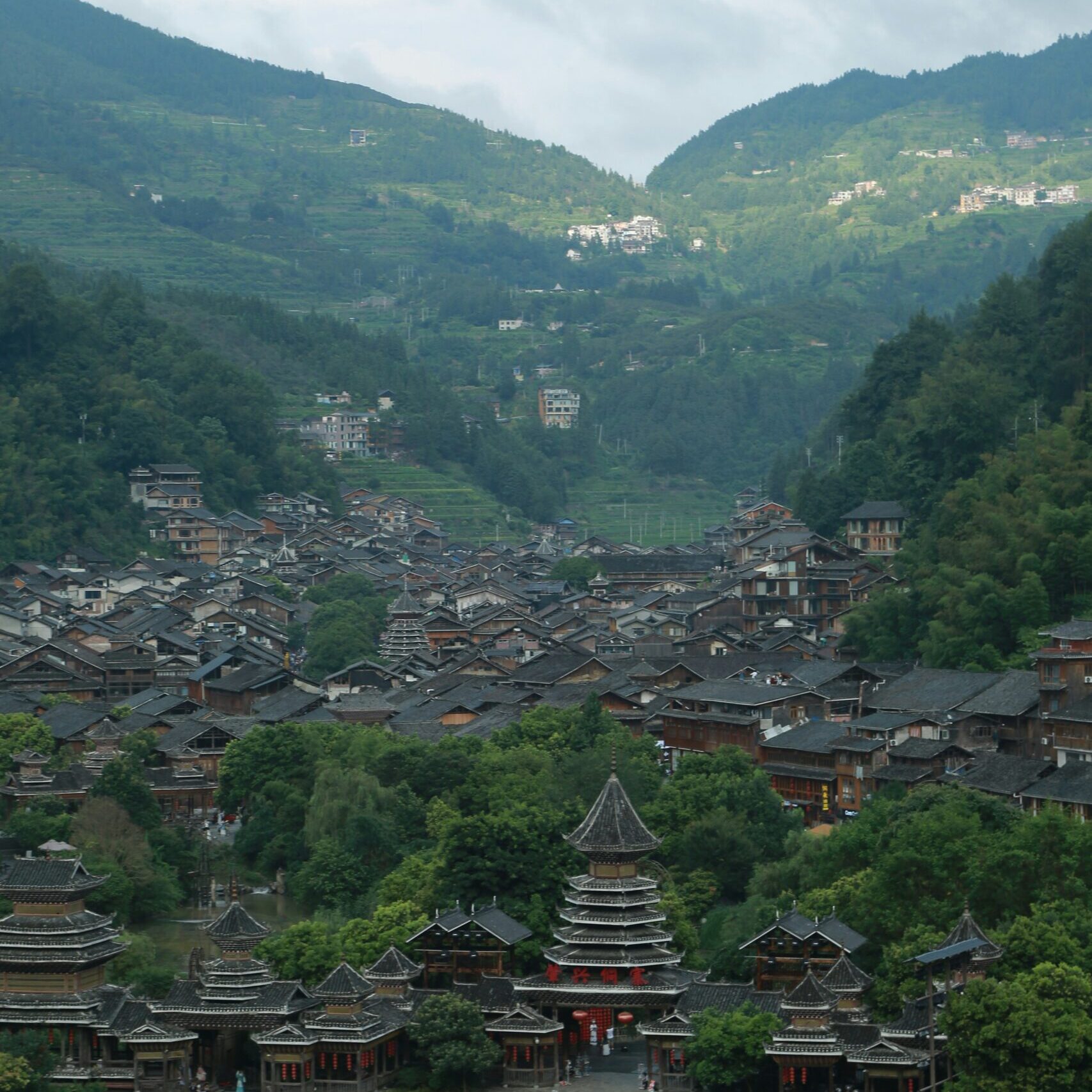 A village in a lush green valley.