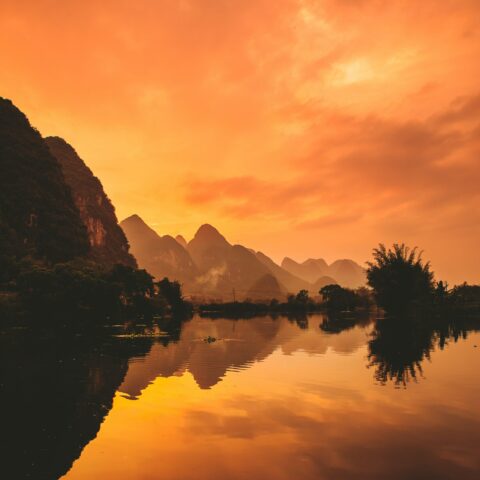 Sun setting in the mountains of China.